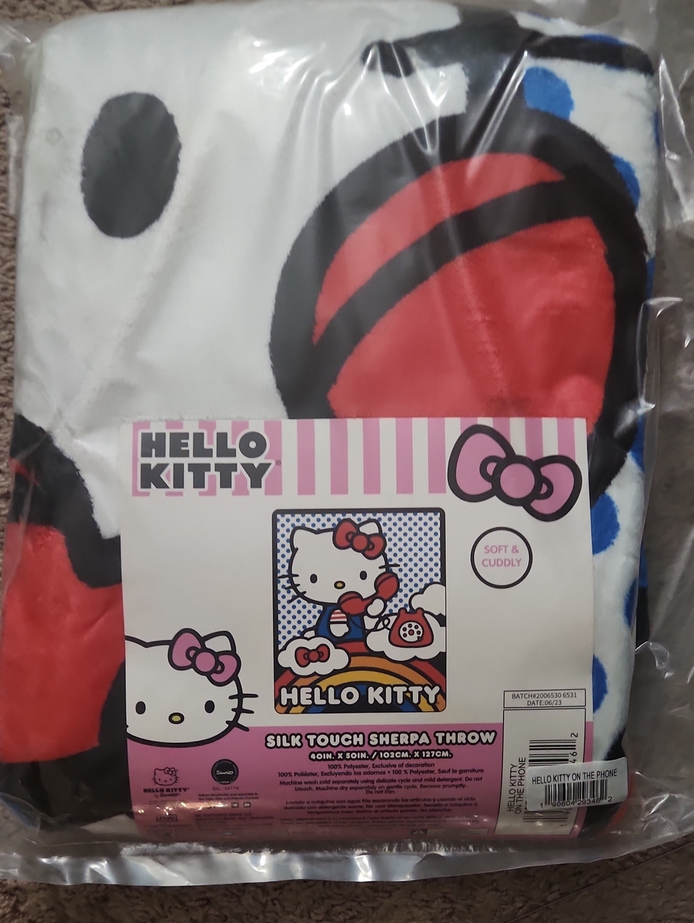 Hello Kitty Silk Touch Sherpa Throw in White, Red, Blue